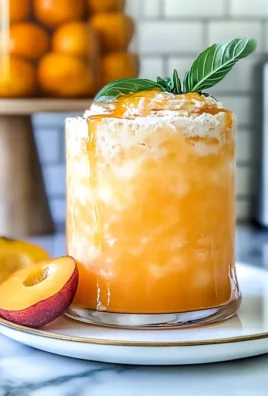 Refreshing Peach Lemonade in a Glass