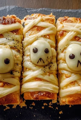 Halloween Mummy Garlic Bread: A Spooktacular Treat!