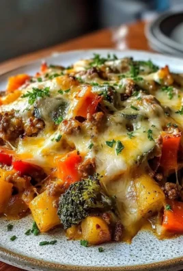 SAVORY ONE-PAN HOBO CASSEROLE WITH MELTING CHEDDAR AND HEARTY VEGETABLES